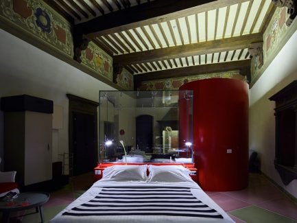 hotel-siena-metrolight-lighting-design-camera-letto-travi-legno