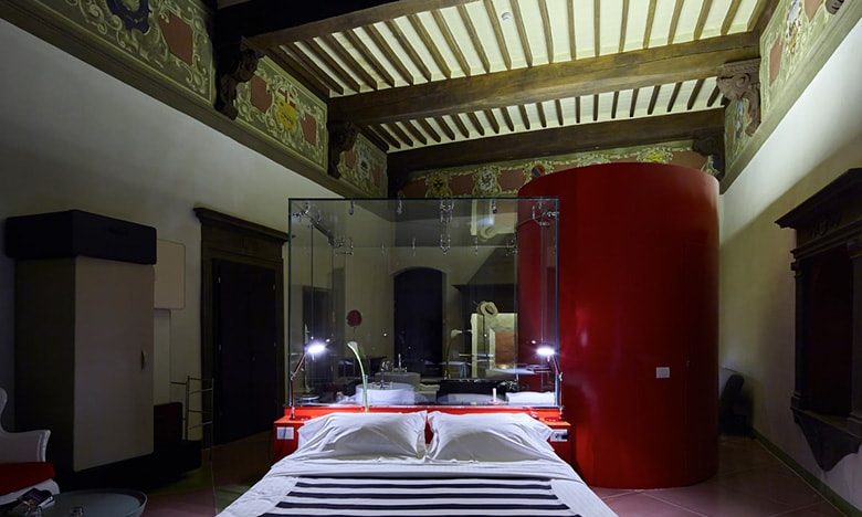 hotel-siena-metrolight-lighting-design-camera-letto-travi-legno